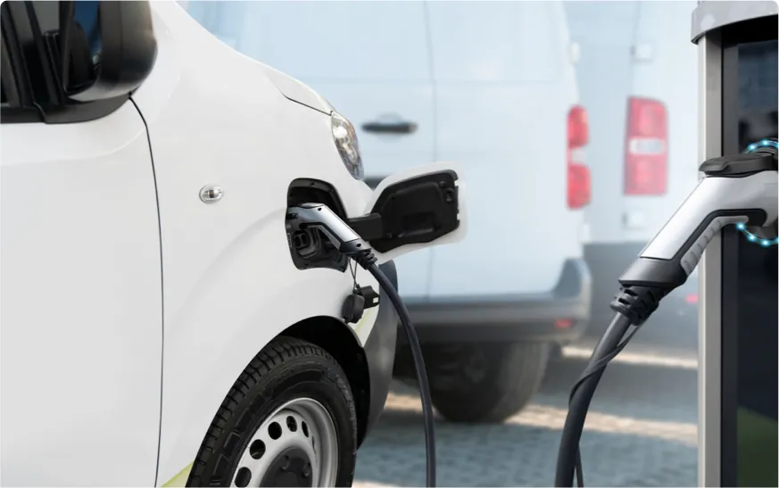 EV Van charging at charging station